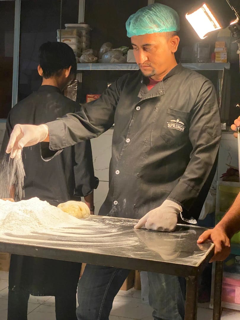 BTS of MA Flour DVC shoot. Chief with flour.